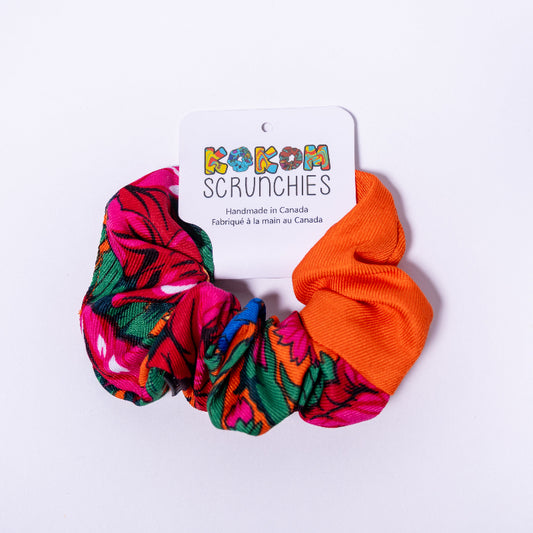 orange scrunchie on a white background with a 'Kokom Scrunchies' label.
