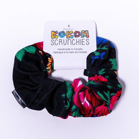 Set of floral and black scrunchies with a 'Kokom Scrunchies' label on a white background