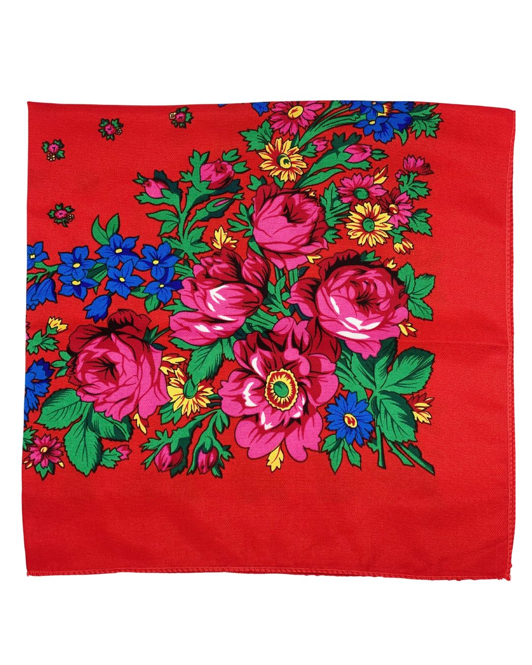 Red fabric folded in half with colorful floral pattern on a white background