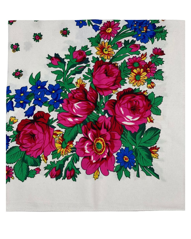 Colorful floral pattern on a white fabric background