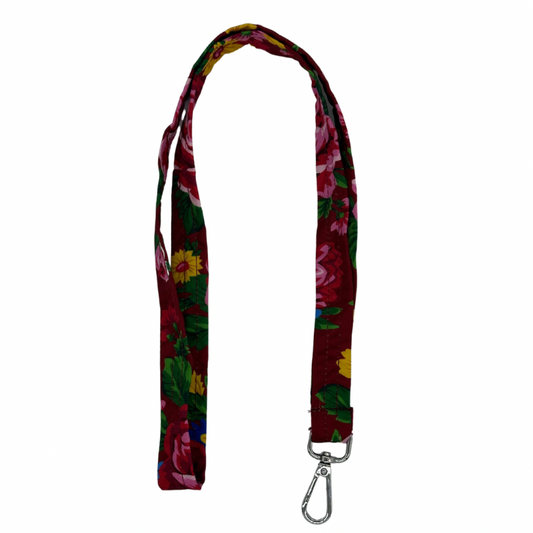 A burgundy lanyard with a clip and a floral pattern.
