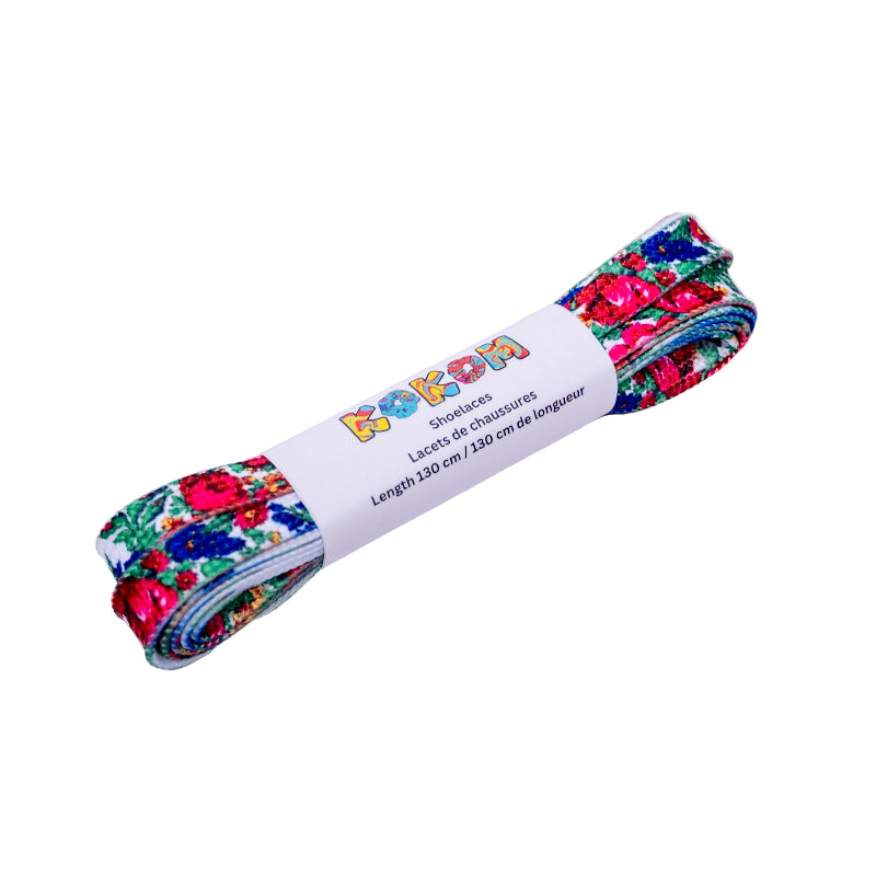 Floral-patterned shoelaces in a cardboard packaging on a white background