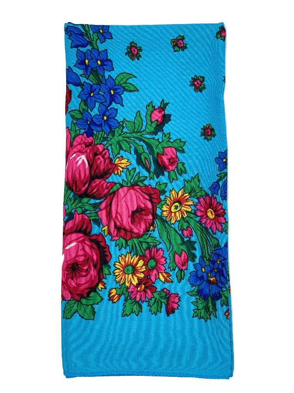 Floral patterned fabric on a light blue background