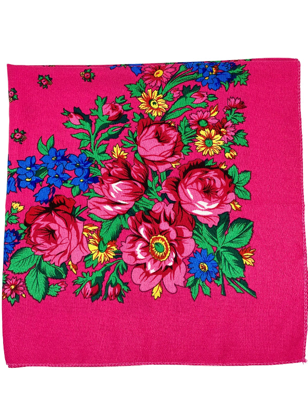 Floral patterned fabric square on a pink background